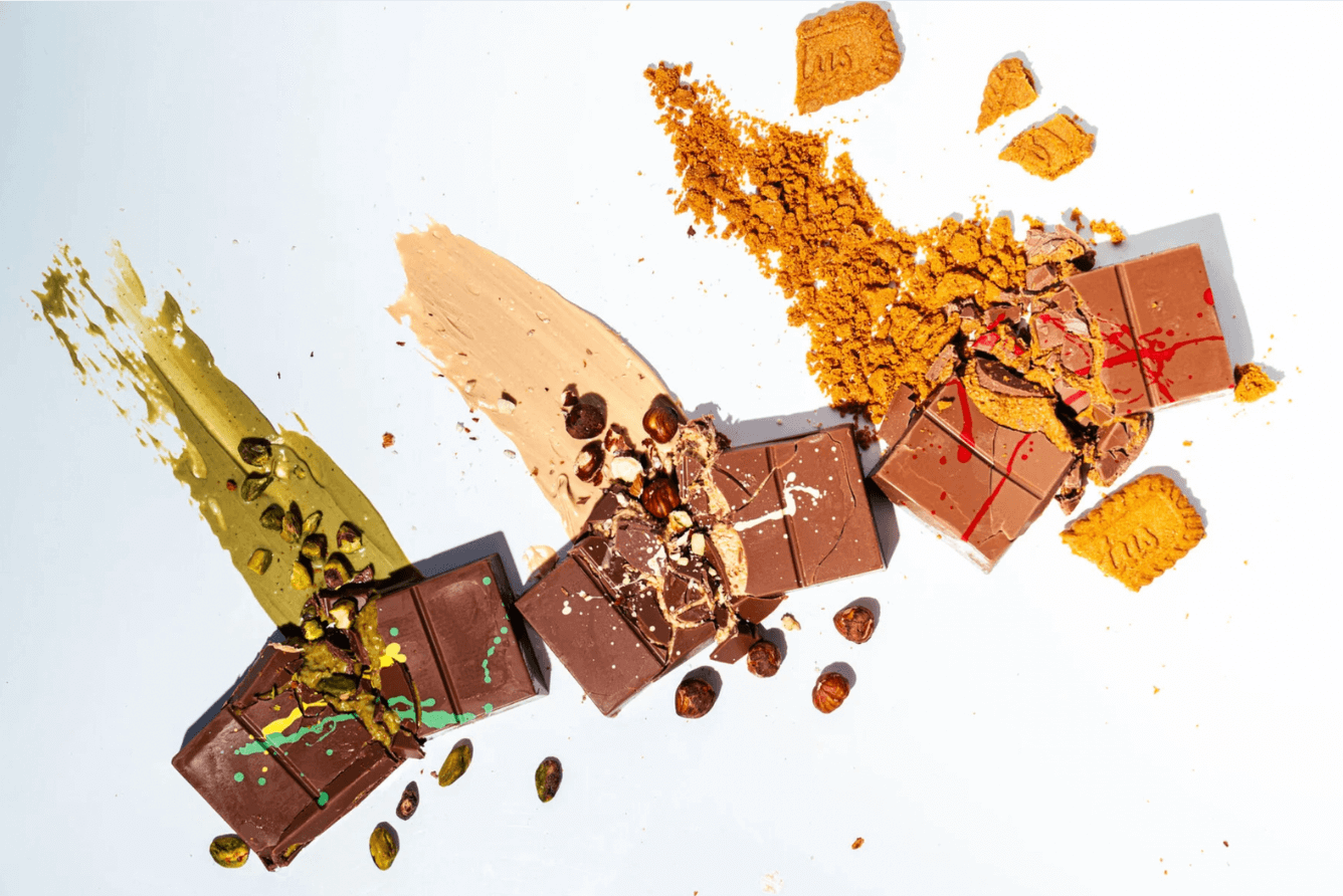 Cracked chocolate bars showing pistachio, hazelnut, and Lotus fillings – viral Dubai-style chocolate bundle